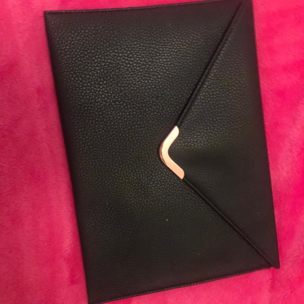 Black and rose gold clutch